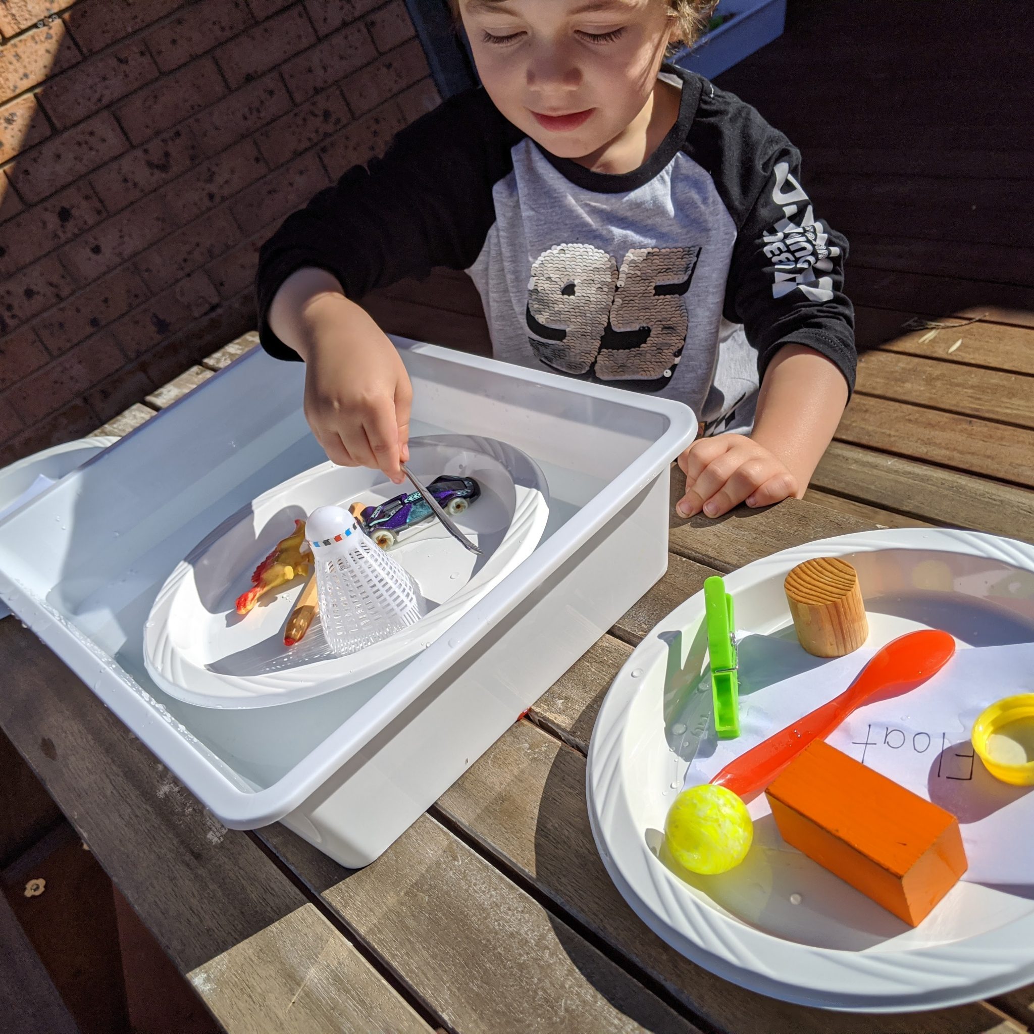 Sink or float experiment happy days bucket filled